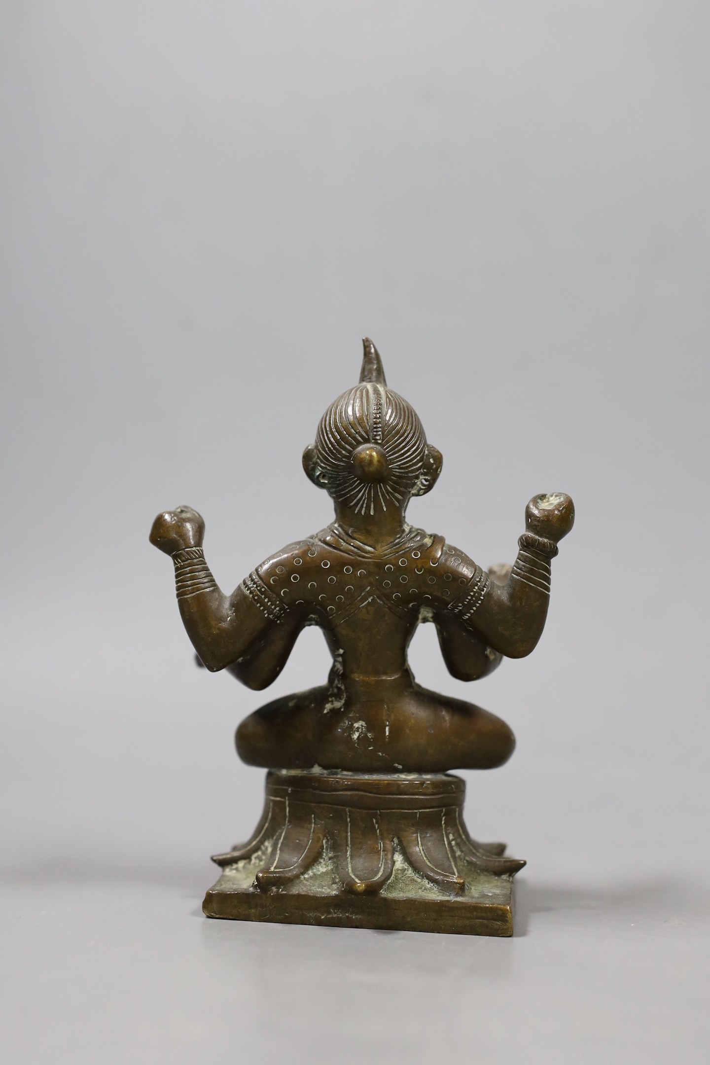 An Indian bronze tantric figure. 14cm high